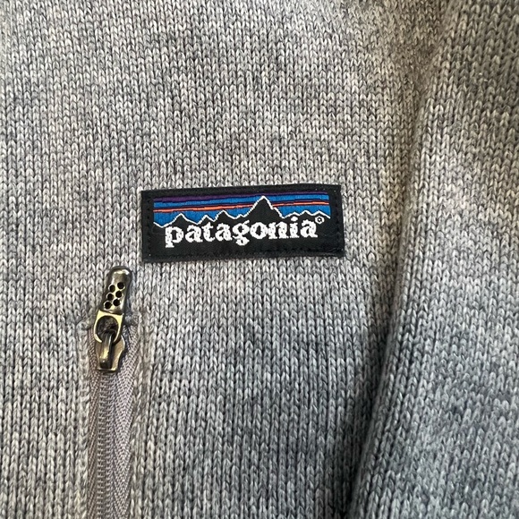 A grey Patagonia sweater with zipper and chest pocket. Comfy and warm. Large. - Picture 3 of 4